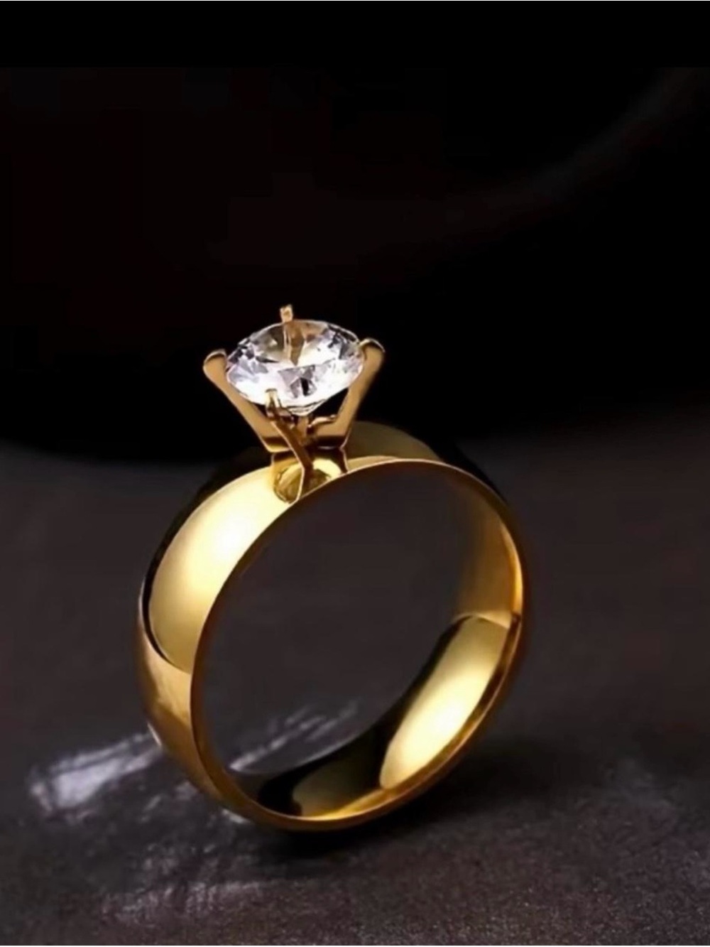 Gold Solitaire Ring with Clear Stone